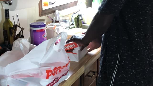 Man Sings with Excitement About Popeyes in Canada