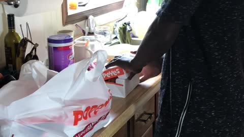 Man Sings with Excitement About Popeyes in Canada