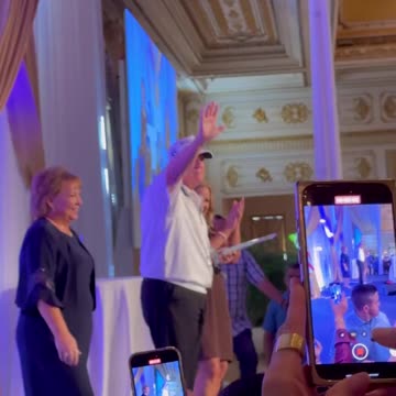 Trump dances with a group of moms at Mar-A-Lago