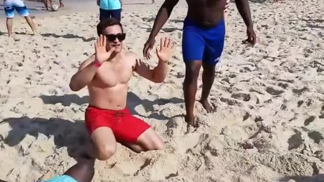 Collab copyright protection - two guys help beach backflip fail