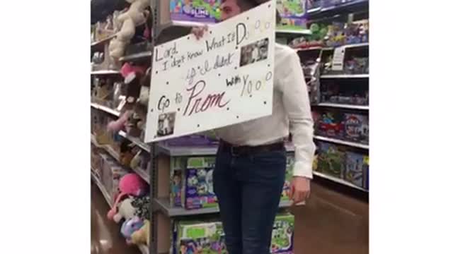 Guy promposal as yodeling boy in walmart