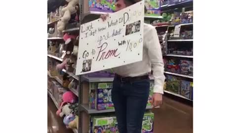 Guy promposal as yodeling boy in walmart