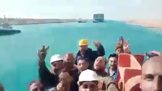 Egyptian crew of tug boat named Mashour celebrate chanting "Mashour is number 1"