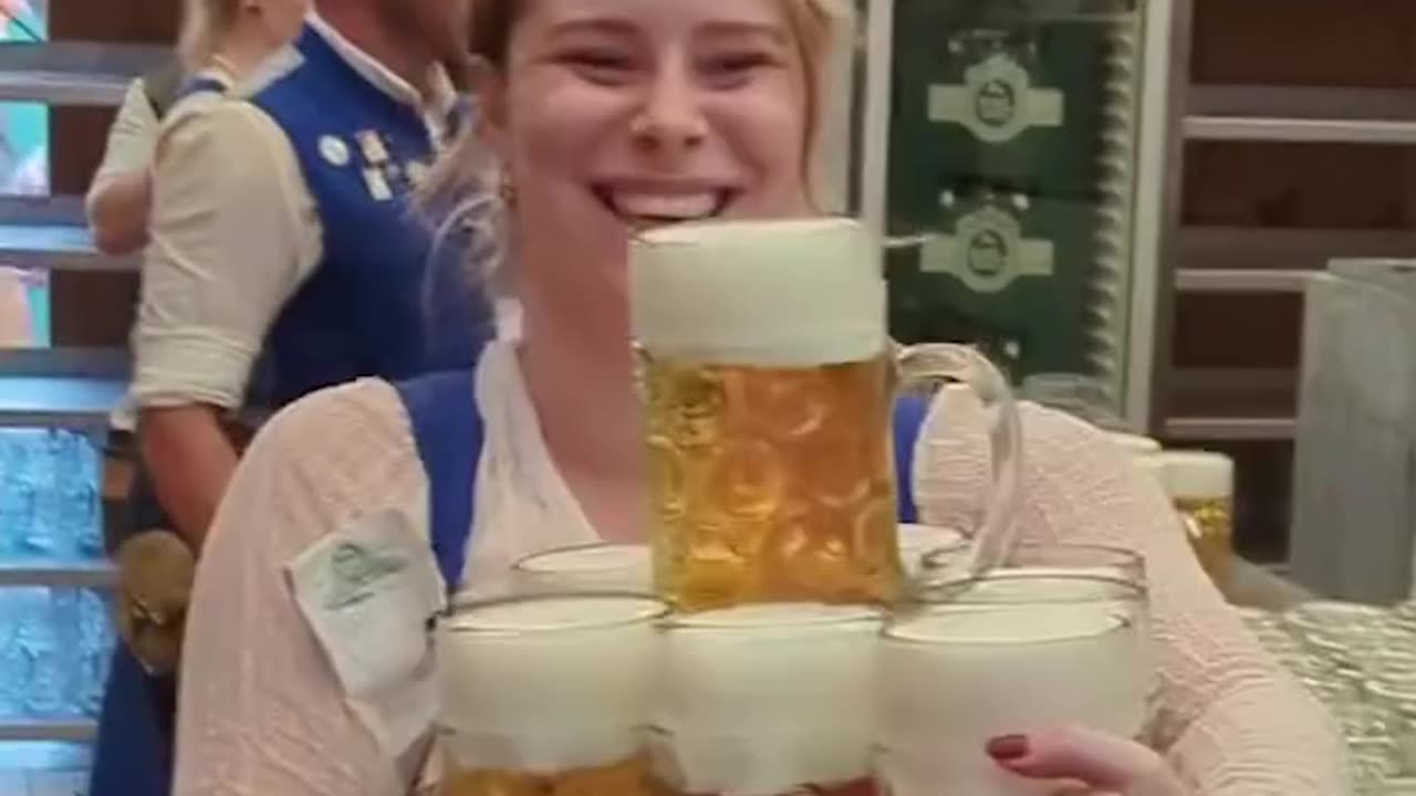Woman Expertly Picks Up Beer Steins