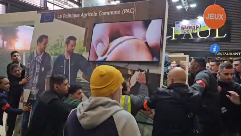 Farmers chant "Macron resign" at the international Agricultural Salon in Porte de Versailles, Paris.
