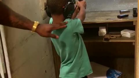 Kids Learn to Shoot at Gun Range