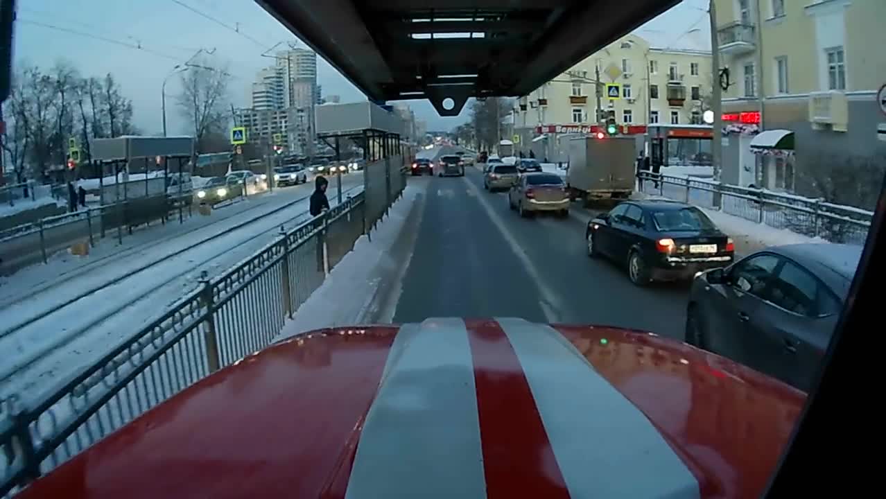 Rush hour. I drive on call in a fire truck