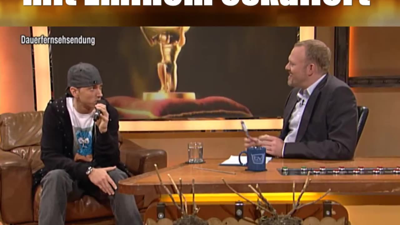 Eminem's tutoring in German swear words escalated.