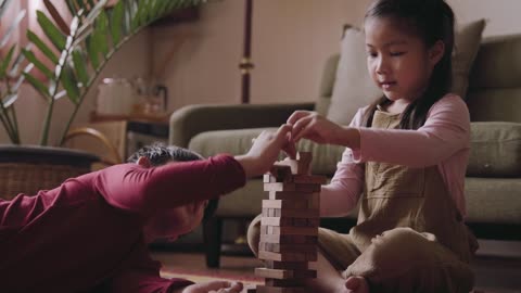 Kids Playing Jenga