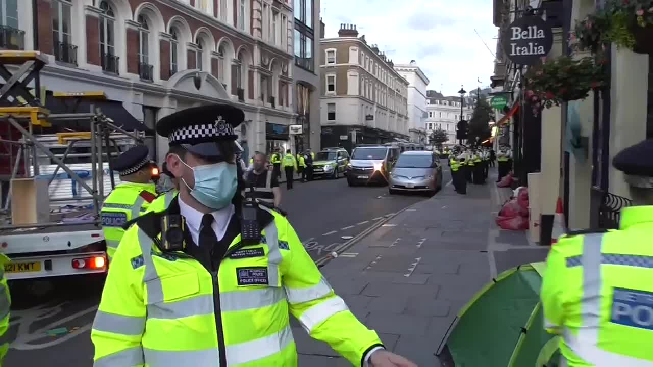 Extinction Rebellion protesters chained to underneath of lorry in London 23/08/2021