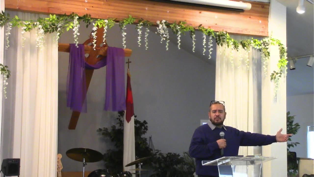 Pastor Julio preaching the Word