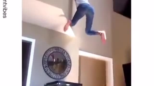 Girl falls and breaks fish tank