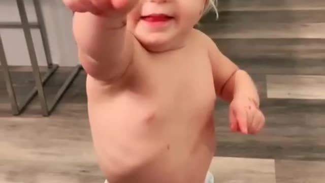 Baby tries to dance when hearing music