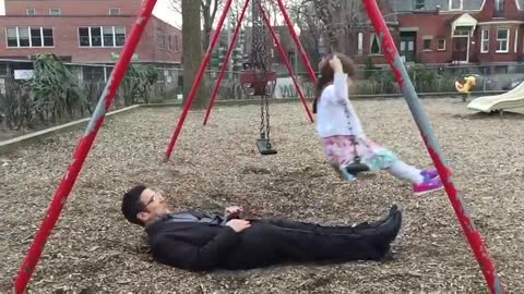 Awesome dad perfects swing stunt at the park