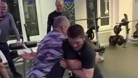 Khabib grappling with his father