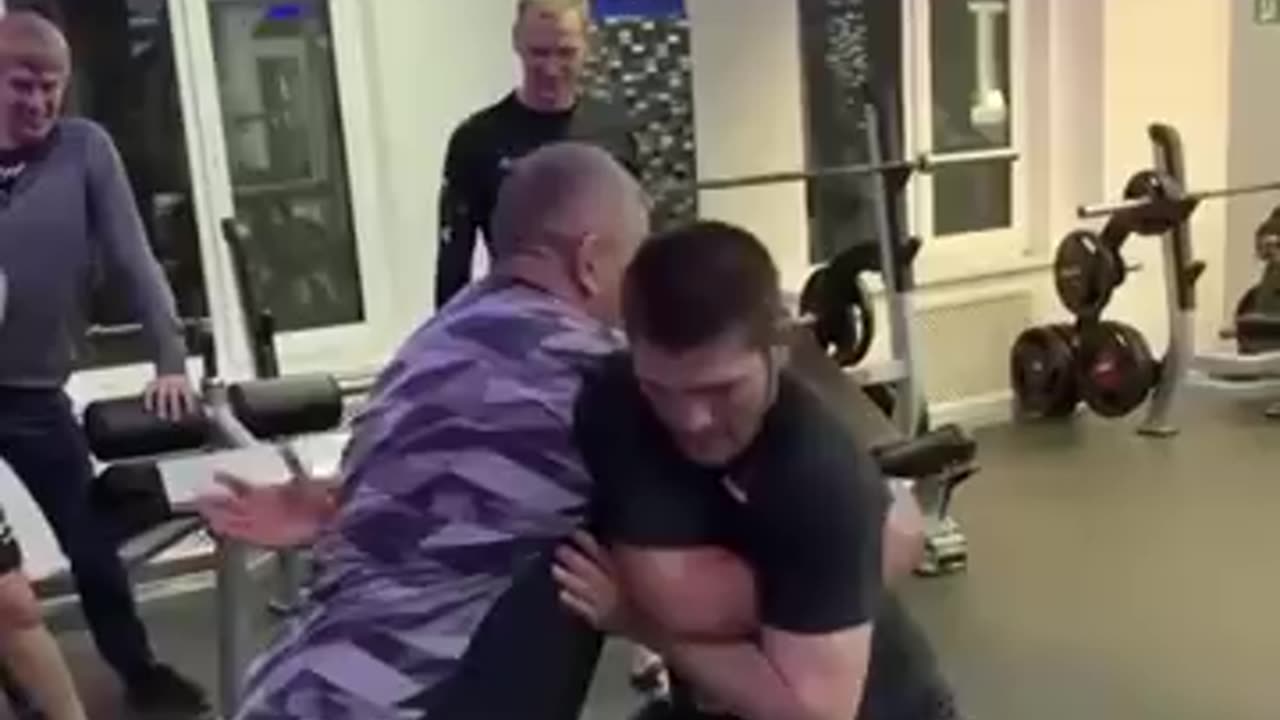 Khabib grappling with his father