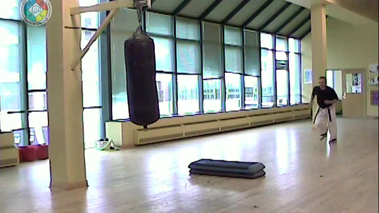 heavy-bag-flying-side-kick-hurdle-front-view