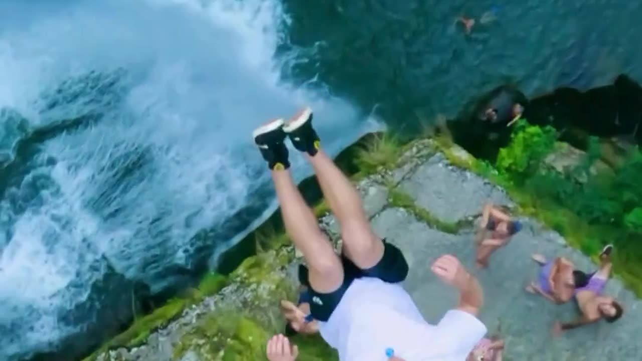 High diving : see the action of diving into water from cliff. Enjoy this adventure sport.
