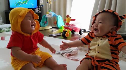 Talking Twin Babies brother makes a sister laugh!