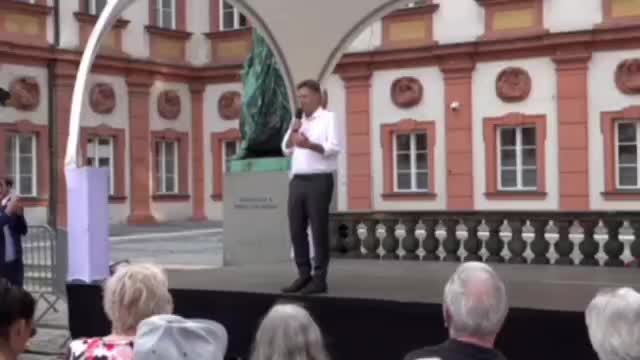 German economy Minister was booed at the speech and called a warmonger