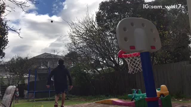 Kid makes kiddie basketball shot