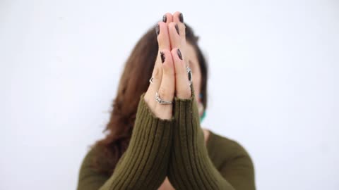 Woman Hands Are Gestured In A Praying Position