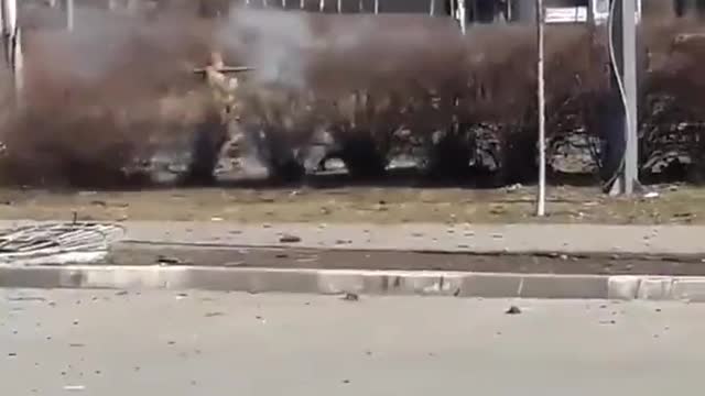 Ukrainian shooting at a BMP-2 with an RPG. Bucha, Ukraine