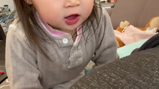 Little Girl Reacts to Baby Brother's Kick in Mom's Tummy