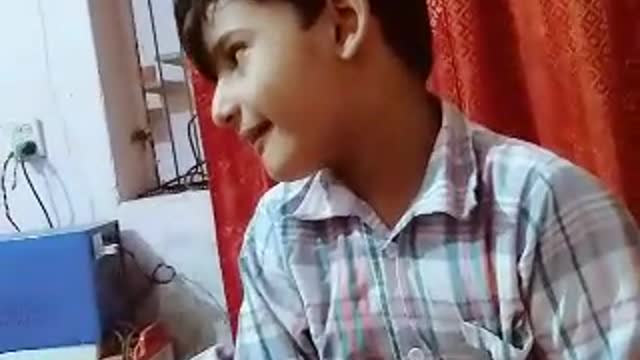 Cute baby using mobail with explained to Turkish Darama Artugh ghazi