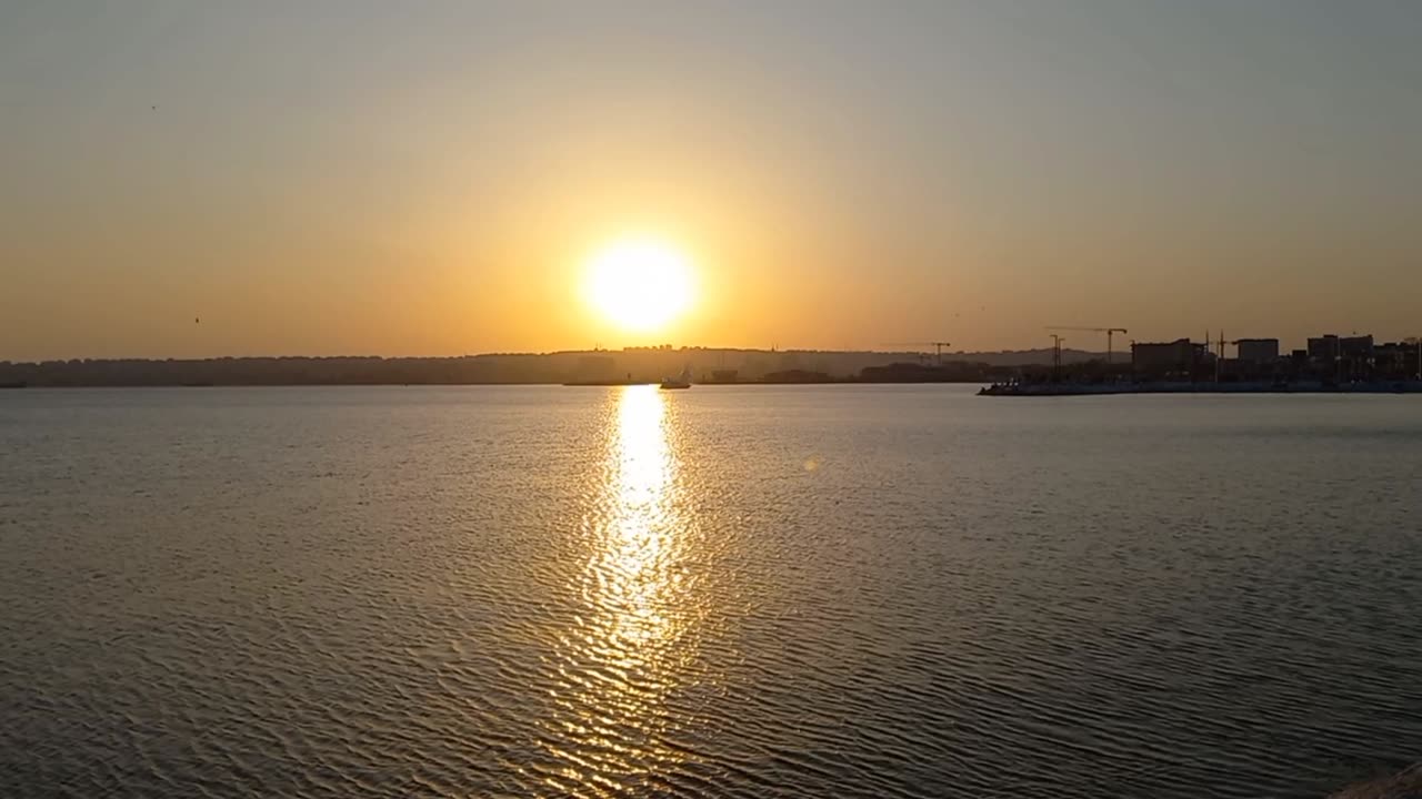 Beautiful sunset view at the sea with music