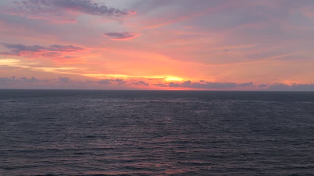 Seaside at sunset zoom in