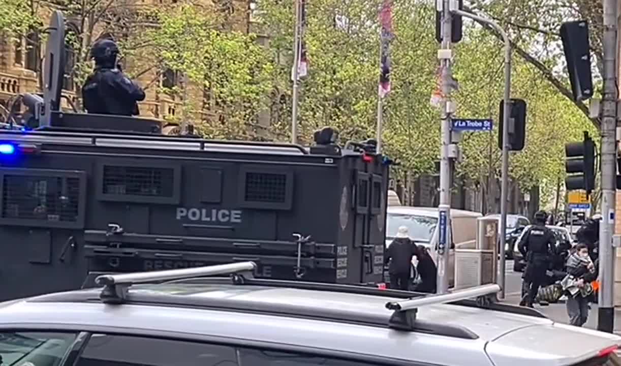 Police fire rubber bullets at anti vax protest from a Military Bearcat G3