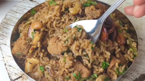 "Savory Delight: Exploring the Wholesome Fusion of Brown Rice Pulao and Soya Nuggets"