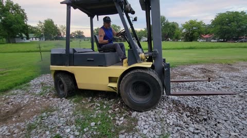 OLD FORKLIFT STUCK IN A GRAVEL PIT