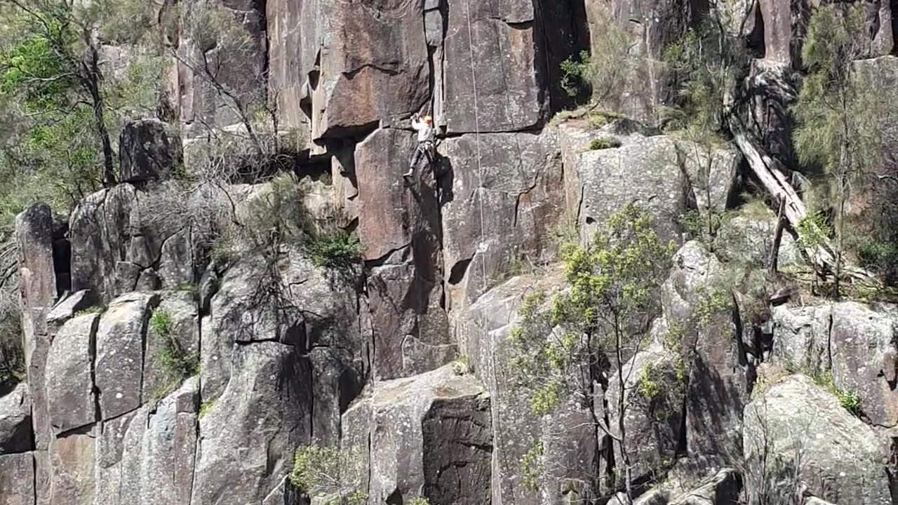 Humans and rocks - Rock climbing.