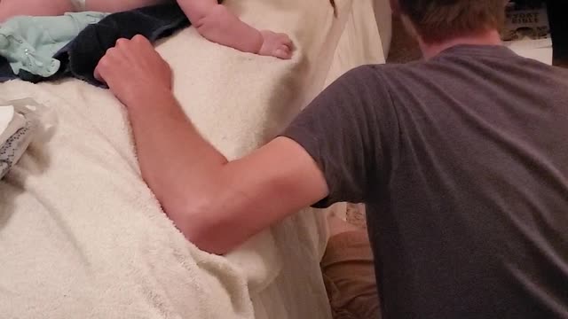 Dad Catches Baby Sliding Off Bed