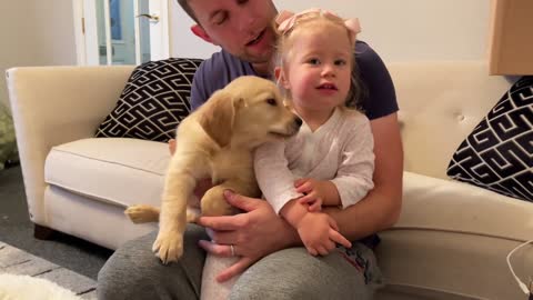 Adorable baby meets her friend