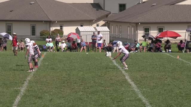 High School Senior George Johnson PUNTS 46 yards in the air.