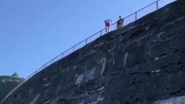 Collab copyright protection - guy jumps off bridge hard