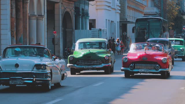 Old Vintage Cars Running On Roads