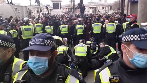 POLICE IN LARGE NUMBERS ARRESTING ONE MAN WORLD WIDE FREEDOM RALLY TRAFALGER SQUARE LONDON