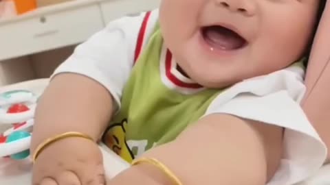 Cute baby laughing