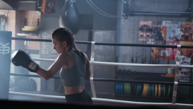 Girl training in boxing