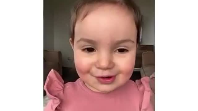 Adorable baby singing song with her heart