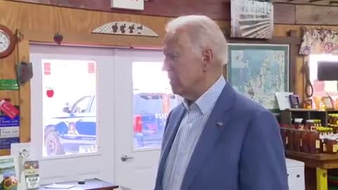 Confused Joe Biden has to pull out notes to answer question