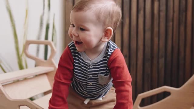 a-baby-playing-on-a-rocker