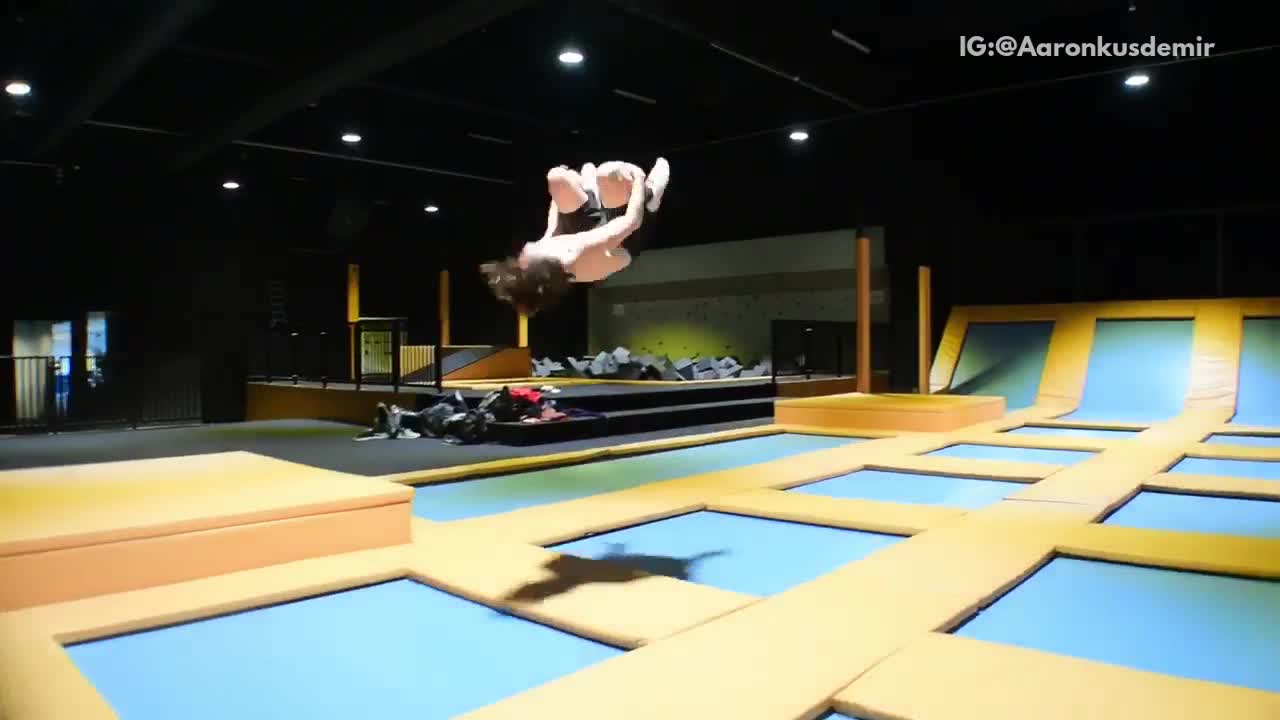 Shirtless guy back flip lands on head