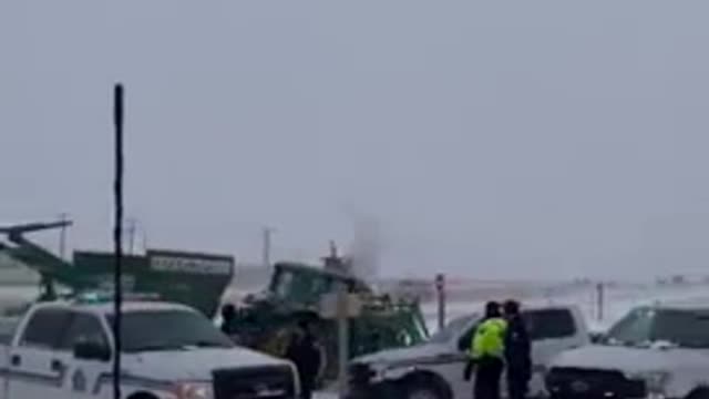 Farmers break thru the RCMP blockade in Coutts Alberta