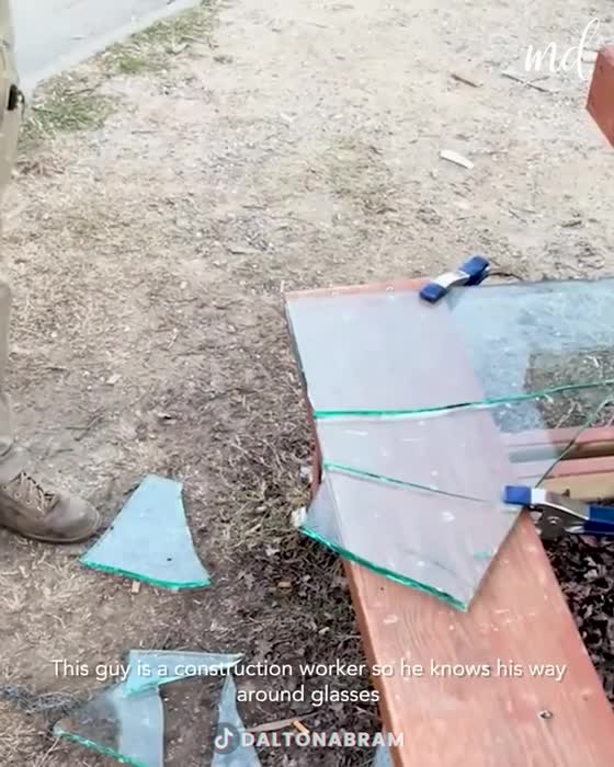 Construction worker shows us satisfying glass cuts