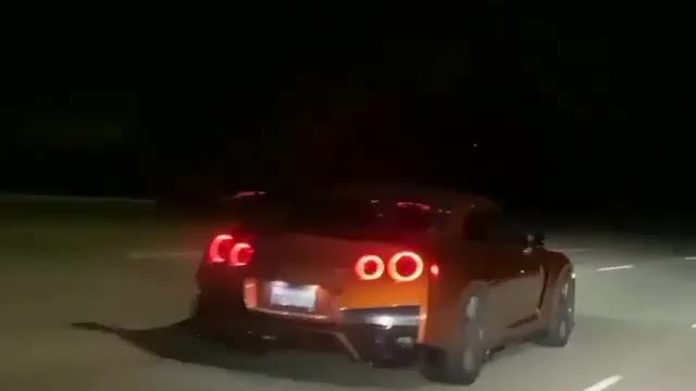 Nissan GTR throwing flames